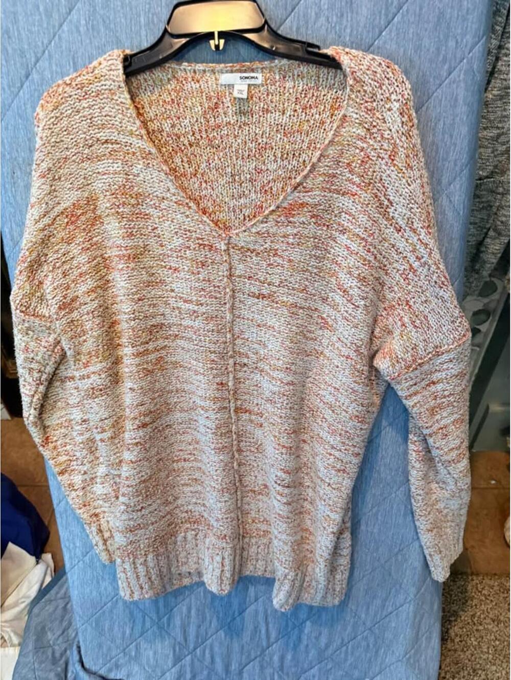 Orange and cream sweater